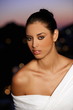 Closeup of young woman in evening wear