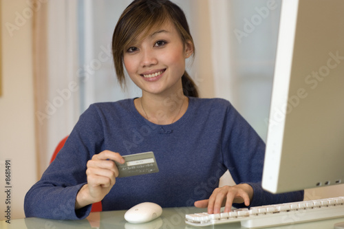Photo: Attractive Woman shopping online Attractive Woman shopping online