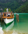 Boat on a lake between mountains Boat on a lake between mountains