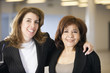 Photo: Portrait of two smiling women. Portrait of two smiling women.