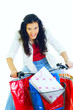 happy young lady on bike returning from shopping