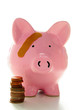 Piggy bank with band-aid. Symbolizes health-care costs Piggy bank with band-aid. Symbolizes health-care costs