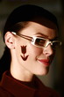 Woman wearing glasses with tulip shape on her face
