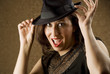 Hispanic Woman Tipping Her Hat