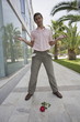 Man with pockets turned out and rose on the ground