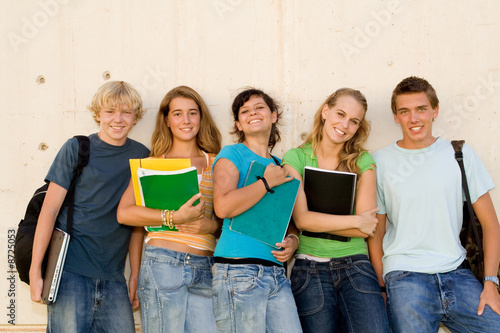 Photo: group of teens students hanging out at school group of teens students hanging out at school