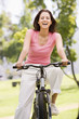 Woman on bicycle smiling