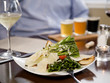 Appetizer salad and white wine