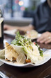 Appetizer salad with shaved parmesan cheese