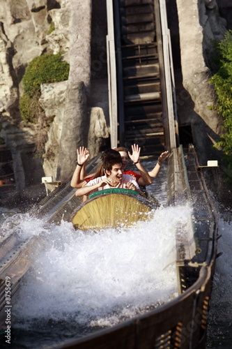 Photo: Teenagers on amusement park ride Teenagers on amusement park ride