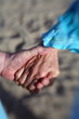 Photo: Closeup of senior couple holding hands Closeup of senior couple holding hands