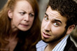 Foto: Angry Woman Looks at a Man Angry Woman Looks at a Man