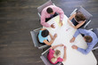 Photo: Five businesspeople at boardroom table Five businesspeople at boardroom table