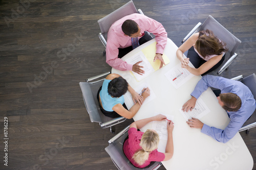 Photo: Five businesspeople at boardroom table Five businesspeople at boardroom table