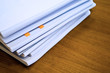 heap of documents on table