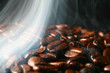 macro coffee beans in aroma smoke