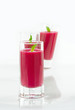 Shots of beetroot soup served for party. Shots of beetroot soup served for party.