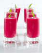 Shots of beetroot soup served for party. Shots of beetroot soup served for party.