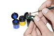 Men painting Miniature soldier's model