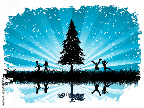 Silhouettes of children playing in snow