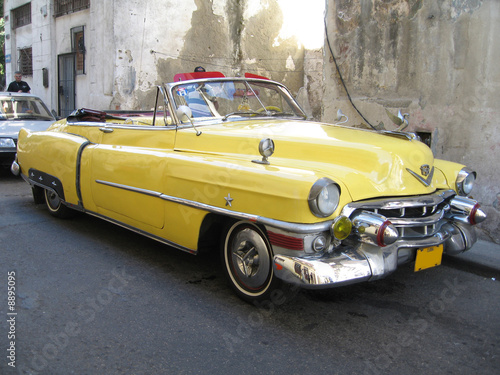 Yellow old cabrio car in Havana Cuba