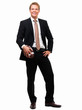 Happy young businessman standing,isolated white background