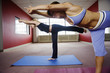 Side view of women stretching their body.