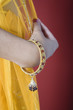 Close up of a woman in Indian clothing.