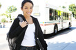 A cute young asian teenager getting off the bus A cute young asian teenager getting off the bus