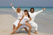 Three friends having fun at beautiful beach