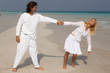 Romantic young couple spending time at the beach