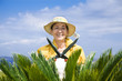 Photo: Portrait of senior Italian woman gardening Portrait of senior Italian woman gardening