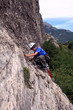 child rock climbing