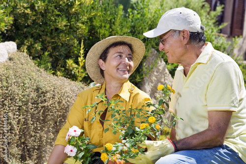Photo: Portrait of senior Italian couple in garden Portrait of senior Italian couple in garden