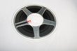 Retro Film reel on white. Good movie industry concept