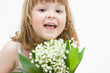little, pretty girl holding bunch of lilies of the valley little, pretty girl holding bunch of lilies of the valley