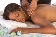 Photos : African-American woman getting massage in spa