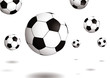 Collection of footballs bouncing on a plain white background Collection of footballs bouncing on a plain white background