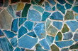 colored (prevaling blue) rough wall surface made of wild stones