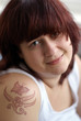 Portrait of young plump woman with tattoo Portrait of young plump woman with tattoo