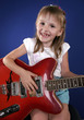 little girl with electric guitar