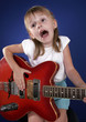 little girl with electric guitar
