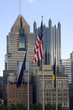 American Flags Near City Buildings