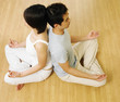 couple practising yoga together