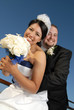 Photo: Happy, fun couple on their wedding day Happy, fun couple on their wedding day