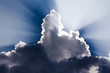Sun Rays shine through a large cloud