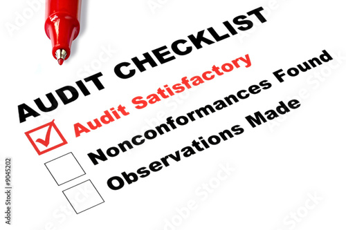 Foto: Audit checklist, with tick against "audit satisfactory" Audit checklist, with tick against "audit satisfactory"