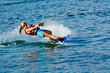 young woman skiing on lake, summer day