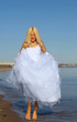 Photo: Bride wolking on the beach Bride wolking on the beach