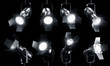 3d rendering of multiple spotlghts on a black background